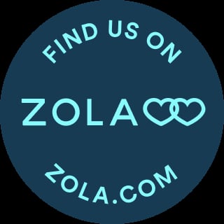 Dark teal circular badge with Find us on Zola logo and website zola.com in light blue text