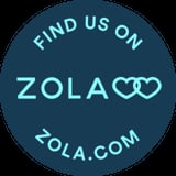 Dark teal circular badge with text Find Us On ZOLA and website zola.com in light blue letters